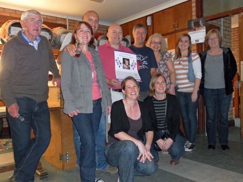 Rugby Club enthusiastic drinkers and Bar Steward Alan is holding the calender